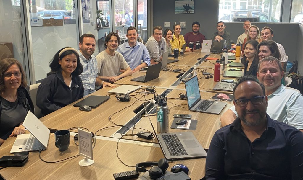 Demand side Analytics Team at meeting in conference room